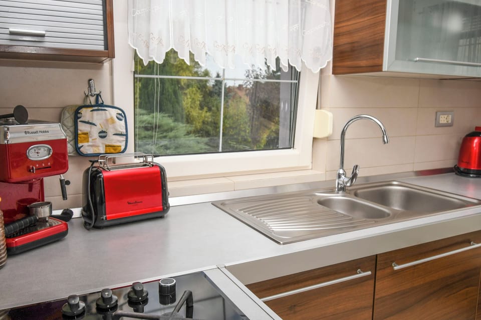 Villa | Private kitchen | Fridge, microwave, oven, stovetop