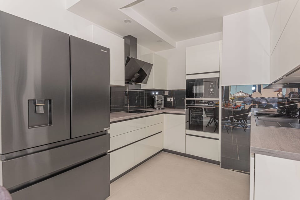 Villa | Private kitchen | Fridge, microwave, oven, stovetop