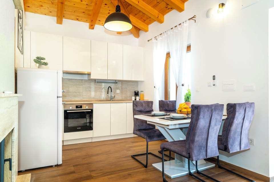 Villa | Private kitchen | Fridge, oven, stovetop, dishwasher