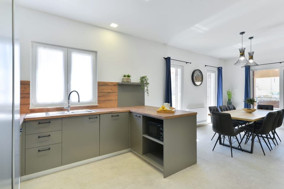 Villa | Private kitchen | Fridge, microwave, oven, stovetop