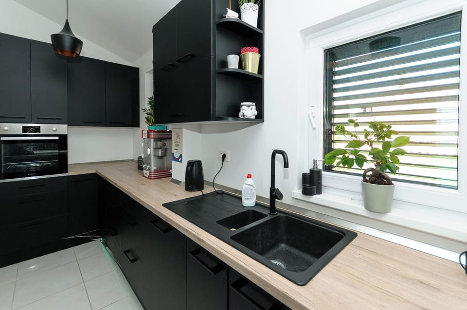 Villa | Private kitchen | Fridge, microwave, oven, stovetop