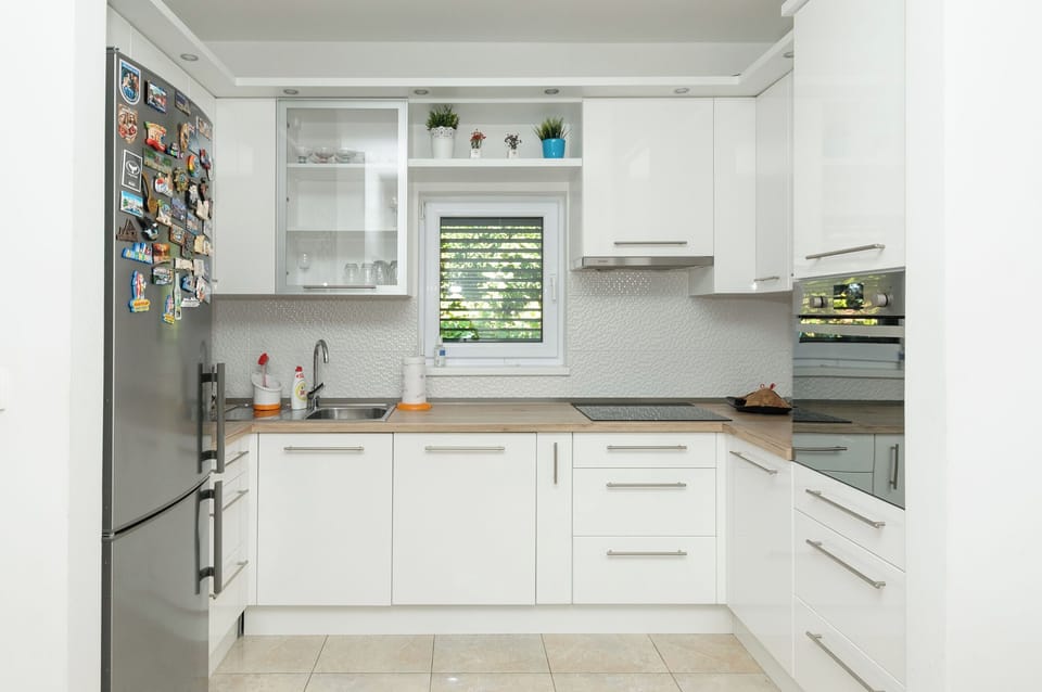 Villa | Private kitchen | Fridge, microwave, oven, stovetop