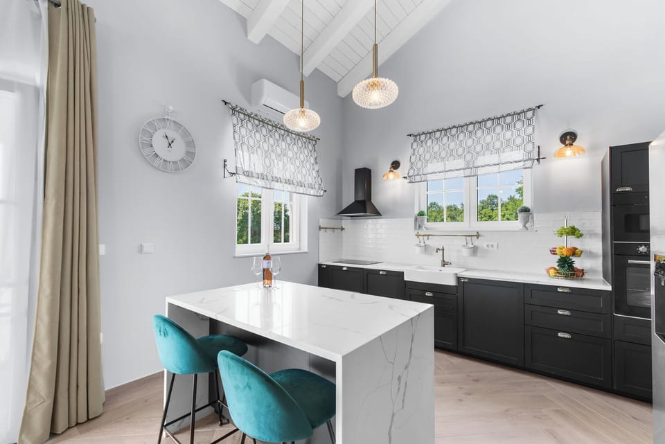 Villa | Private kitchen | Fridge, microwave, oven, stovetop