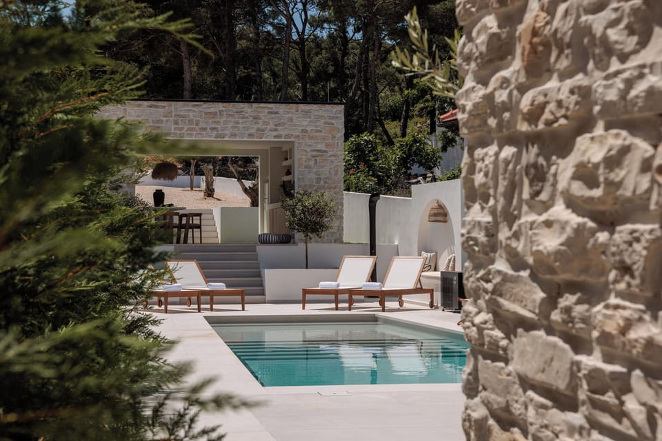 Outdoor pool, a heated pool, open open 24 hours, pool umbrellas
