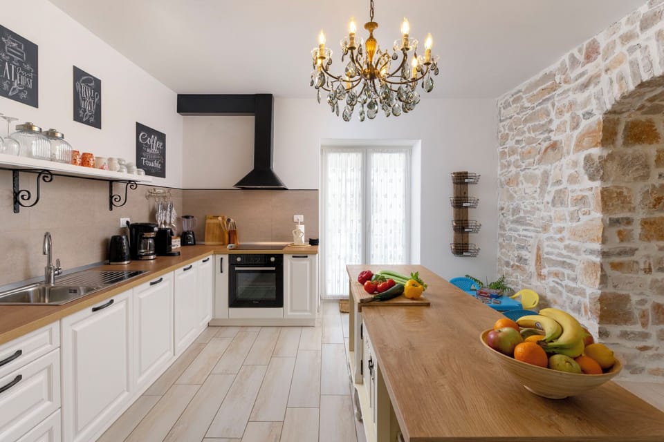 Villa | Private kitchen | Fridge, microwave, oven, stovetop