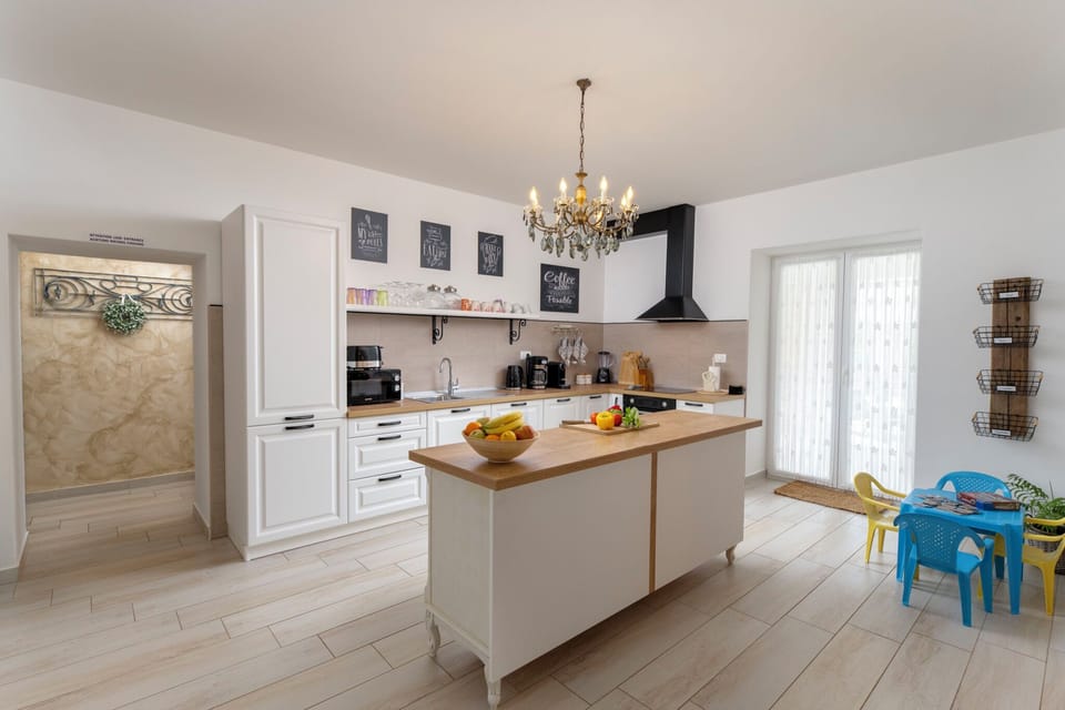 Villa | Private kitchen | Espresso maker, fridge, microwave, oven