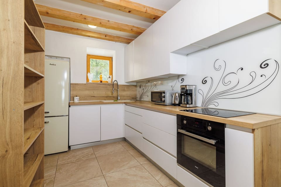 Villa | Private kitchen | Espresso maker, fridge, microwave, oven