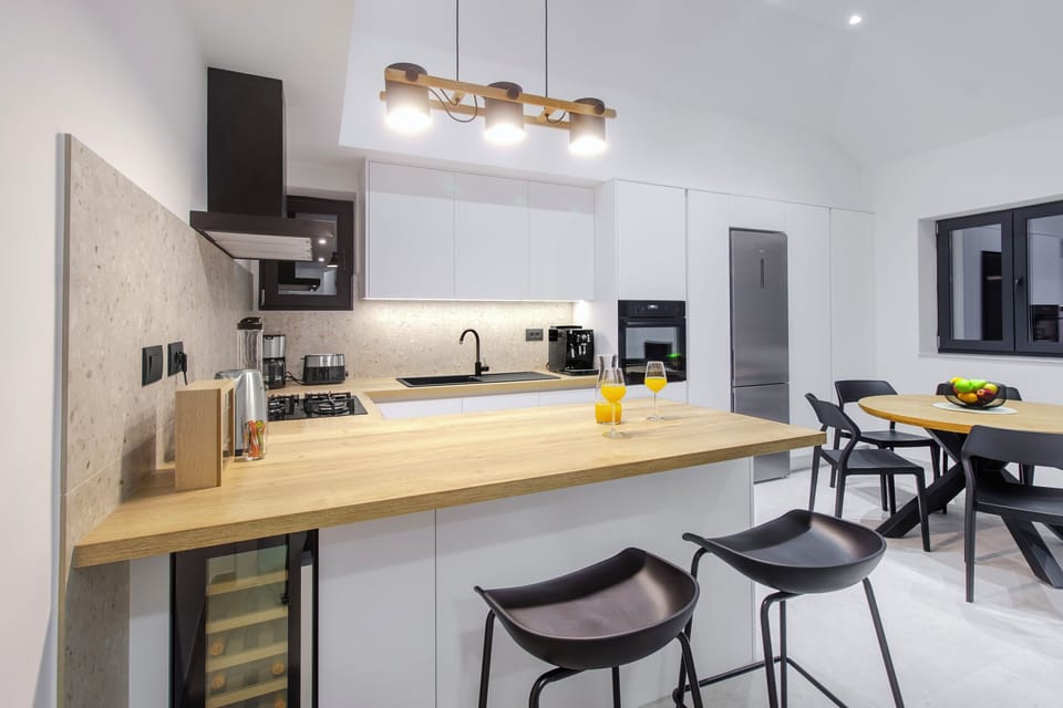 Villa | Private kitchen | Fridge, microwave, oven, stovetop