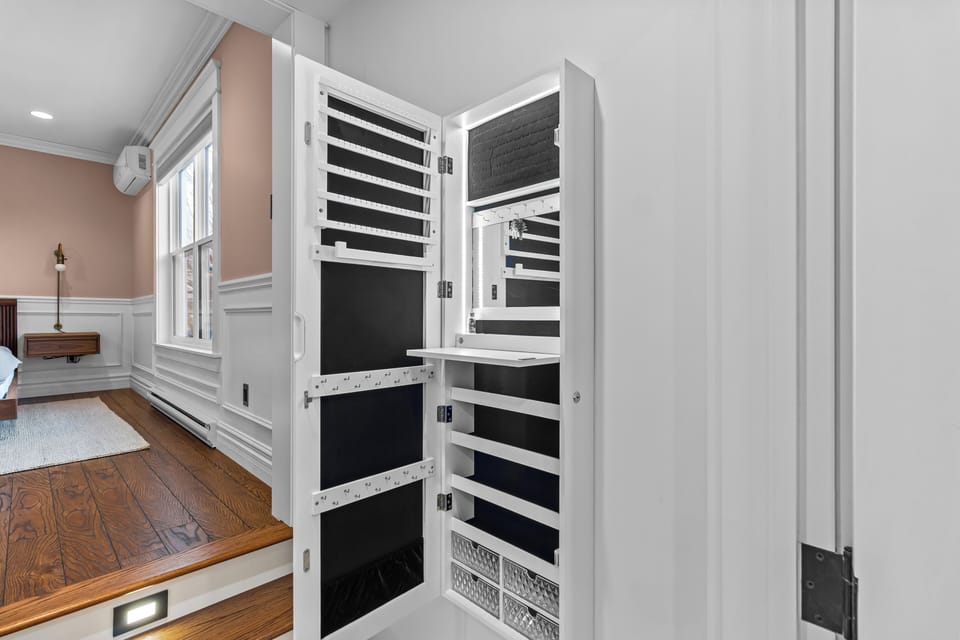 Custom built-in shelving unit, perfect for storing beverages, snacks, or other essentials.