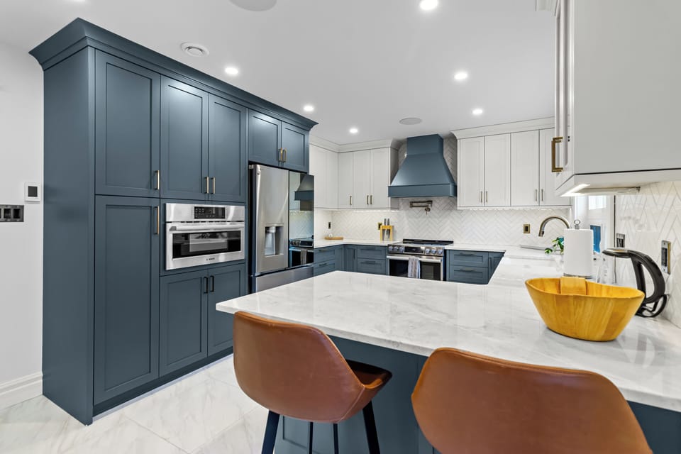 The heart of the home—a massive kitchen island with ample seating, perfect for breakfast or socializing while cooking.