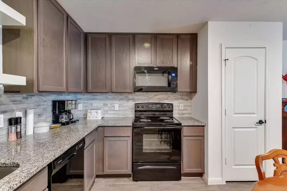 Cook like a pro in this modern kitchen with a fully stocked kitchen!