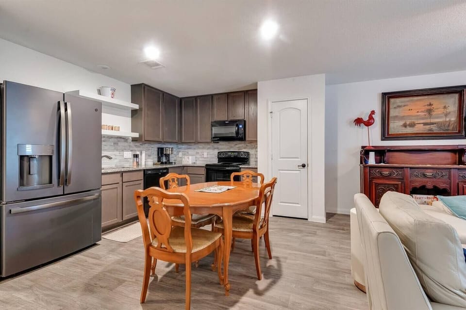 Gather around the table for home-cooked meals and vacation planning with the family. The dining area is the heart of the home. Meals feel like events and conversations never stop.