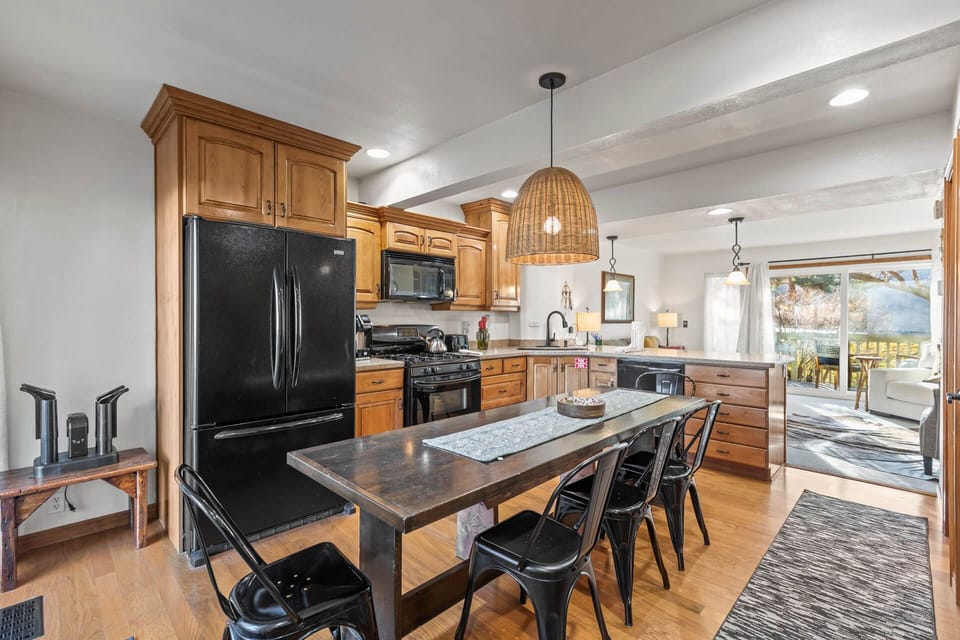 Your gourmet kitchen features granite counters, full appliances, and a spacious island where you'll create memorable meals together.