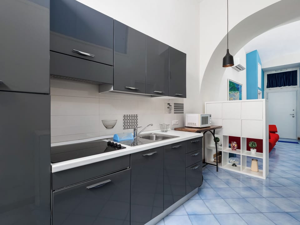 Comfort Apartment | Private kitchen | Fridge, microwave, stovetop, electric kettle