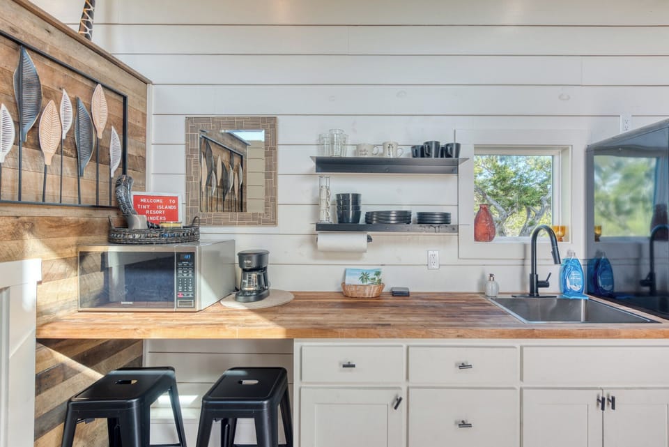 The tiny home features a kitchenette