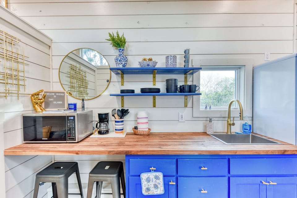 The tiny home features a kitchenette