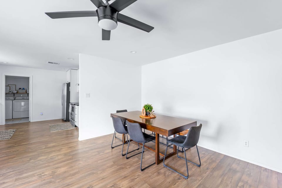 Share memorable meals and laughter at the inviting dining table.