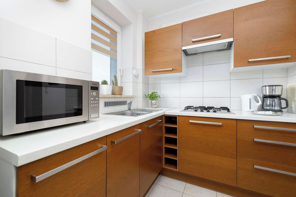 The fully equipped kitchenette includes everything you need for a home-cooked meal.