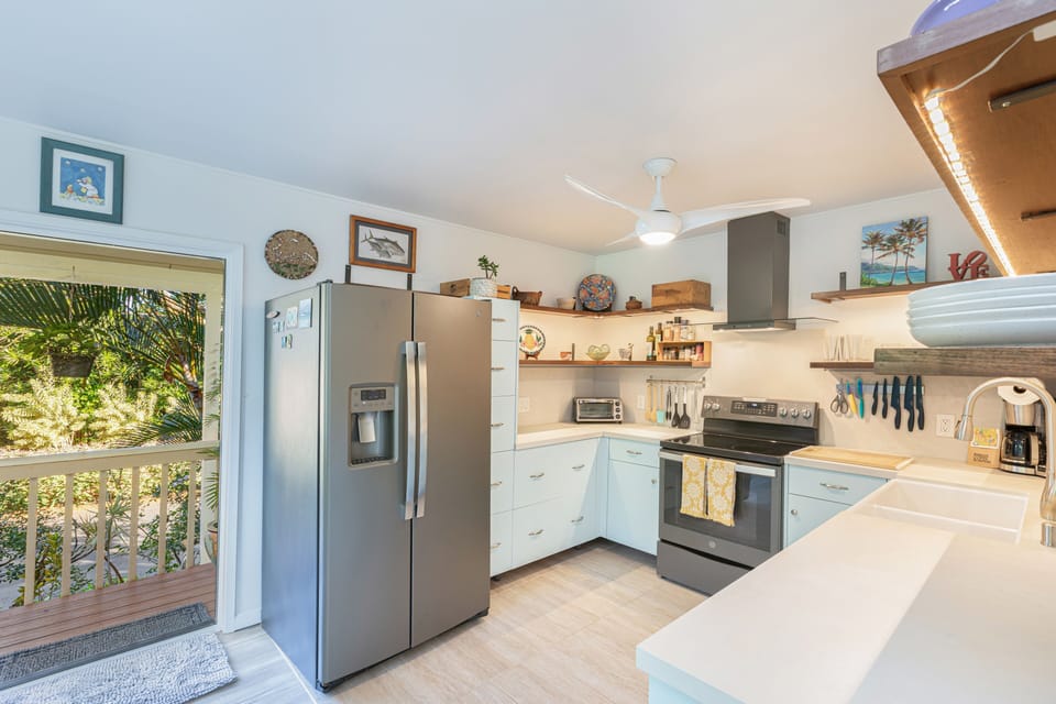 Well-equipped kitchen with full-size appliances and plenty of counter space for easy vacation meals.