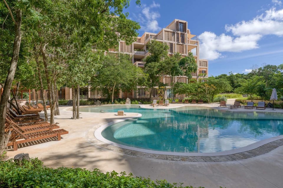 Shared Pool with Sun Loungers