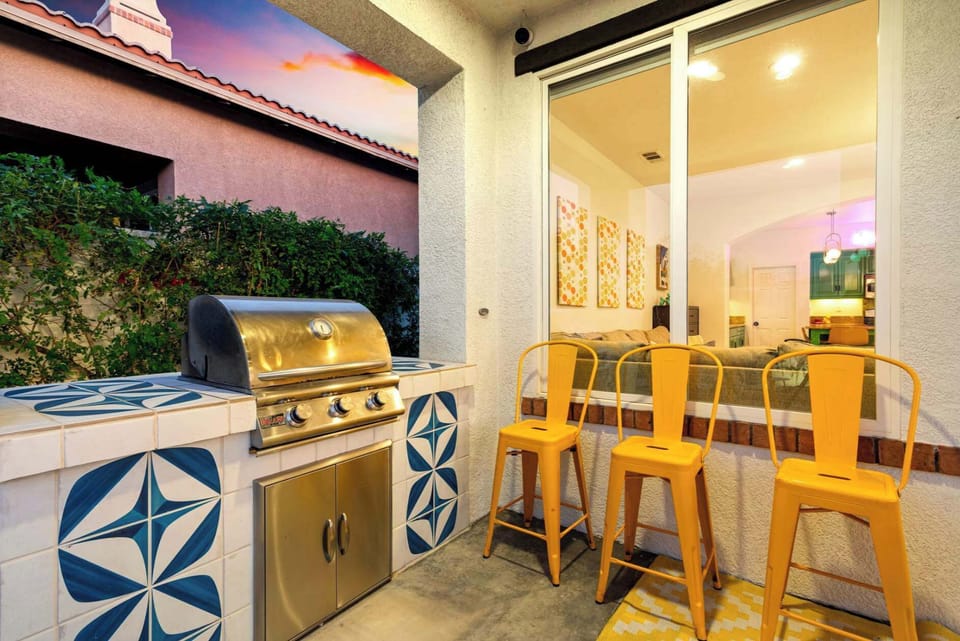 BBQ station and bar seating for outdoor nights