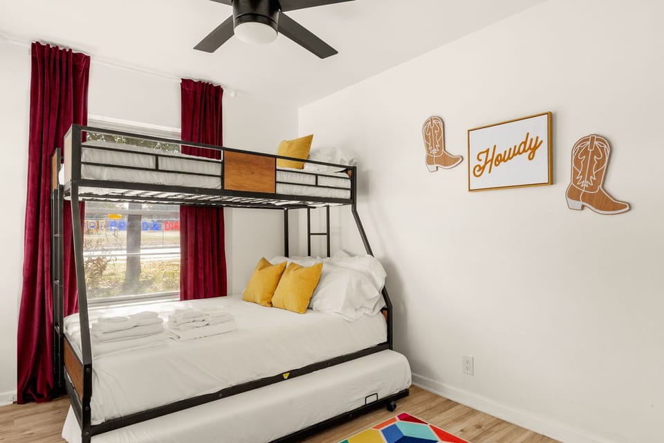 Cozy bunk setup with fresh linens, perfect for kids or extra guests.