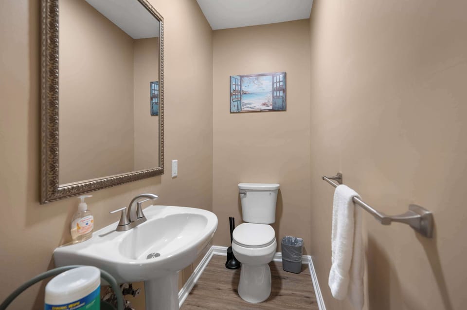Convenient half bath for guests and quick refreshes
