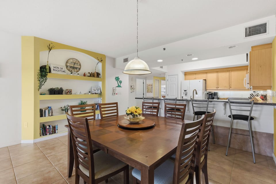 Gather around your spacious dining table for memorable meals, with a fully equipped kitchen ready for your culinary adventures.