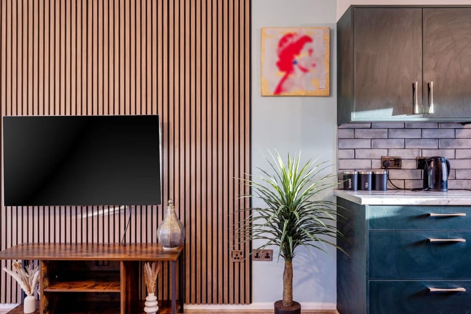 TV feature wall with natural wood slats