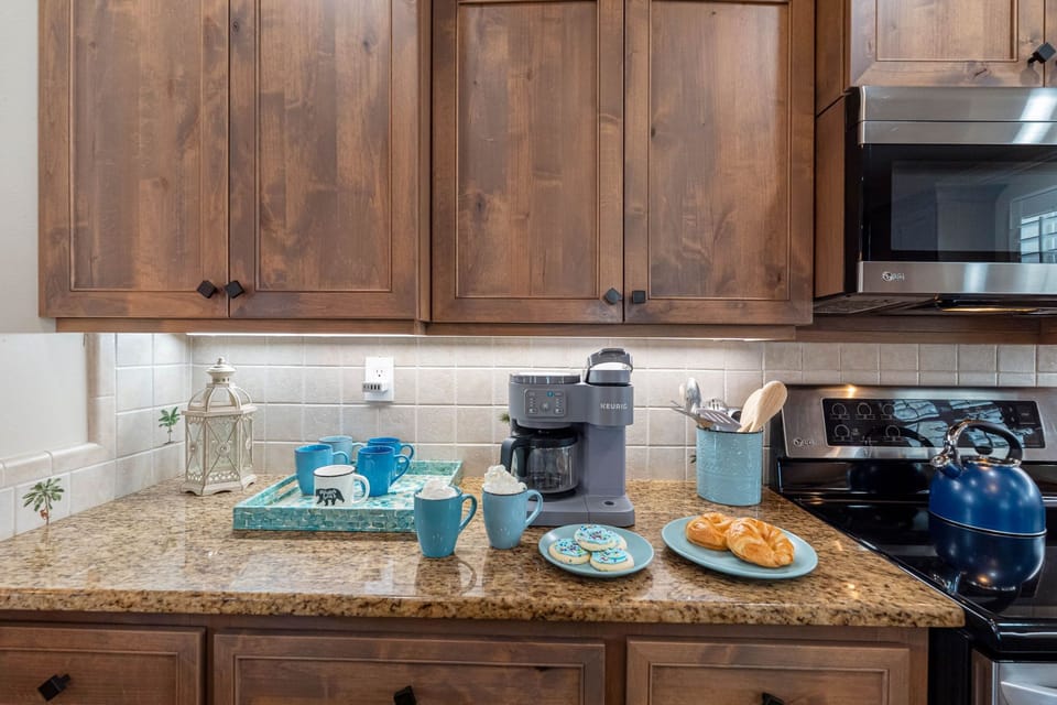The open layout seamlessly connects the kitchen to dining areas, making hosting easy and enjoyable.