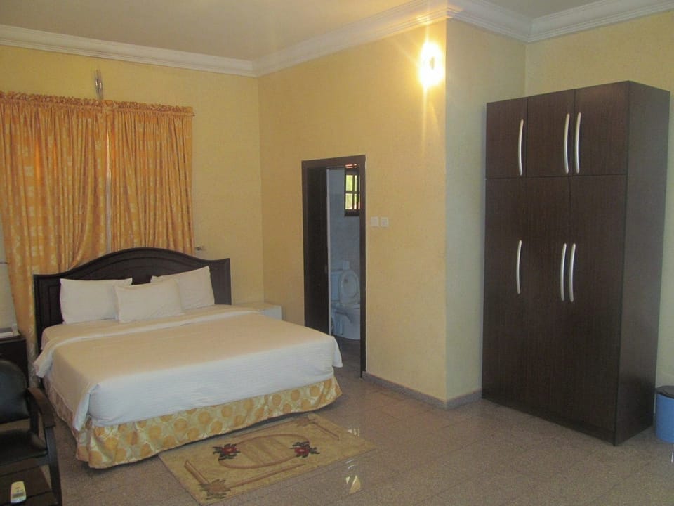 Deluxe Room, Balcony, City View | Desk, laptop workspace, blackout drapes, soundproofing