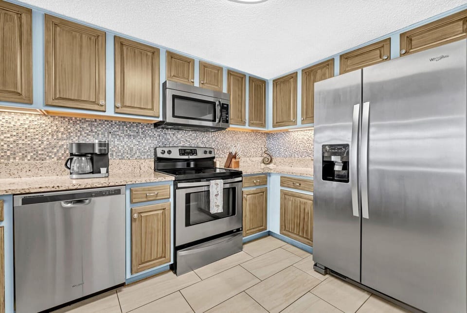 Cook meals in your fully stocked and Remodeled kitchen with Gulf Views - Welcome to your home away from home!