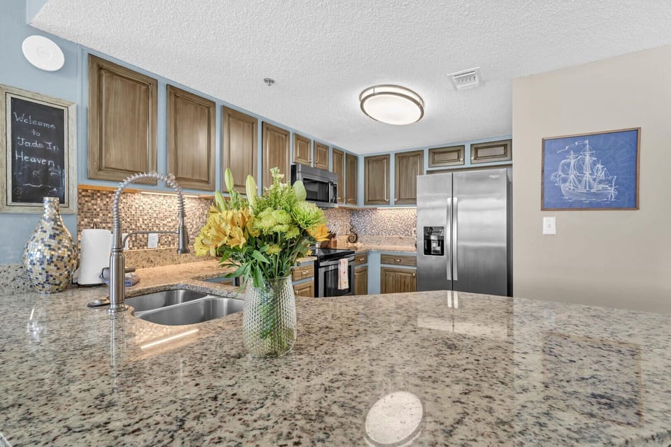 Cook meals in your fully stocked and Remodeled kitchen with Gulf Views - Welcome to your home away from home!