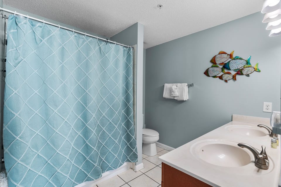 Master Bathroom with dual vanity and shower tub comobo!