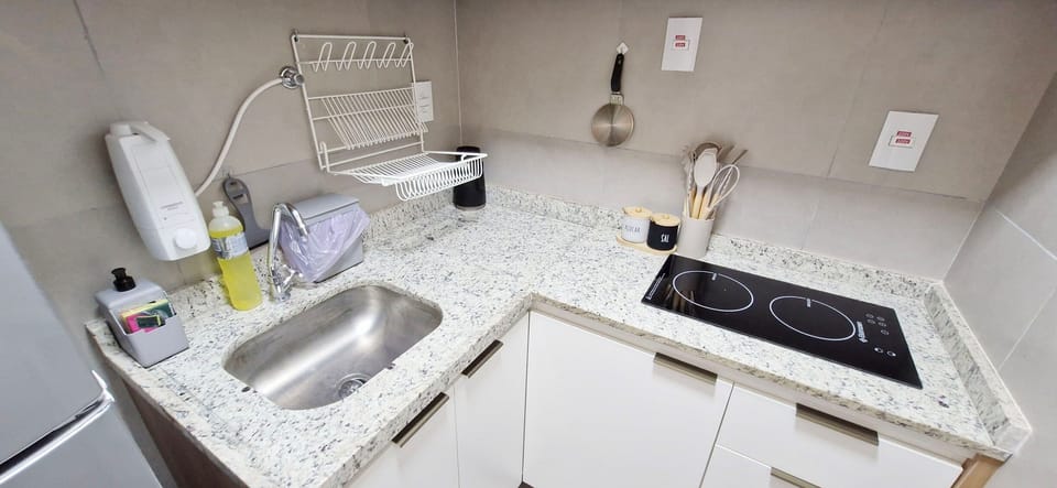 Apartment | Private kitchen | Fridge, microwave, stovetop, blender