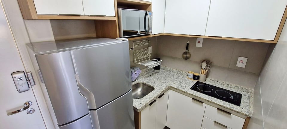 Apartment | Private kitchen | Fridge, microwave, stovetop, blender