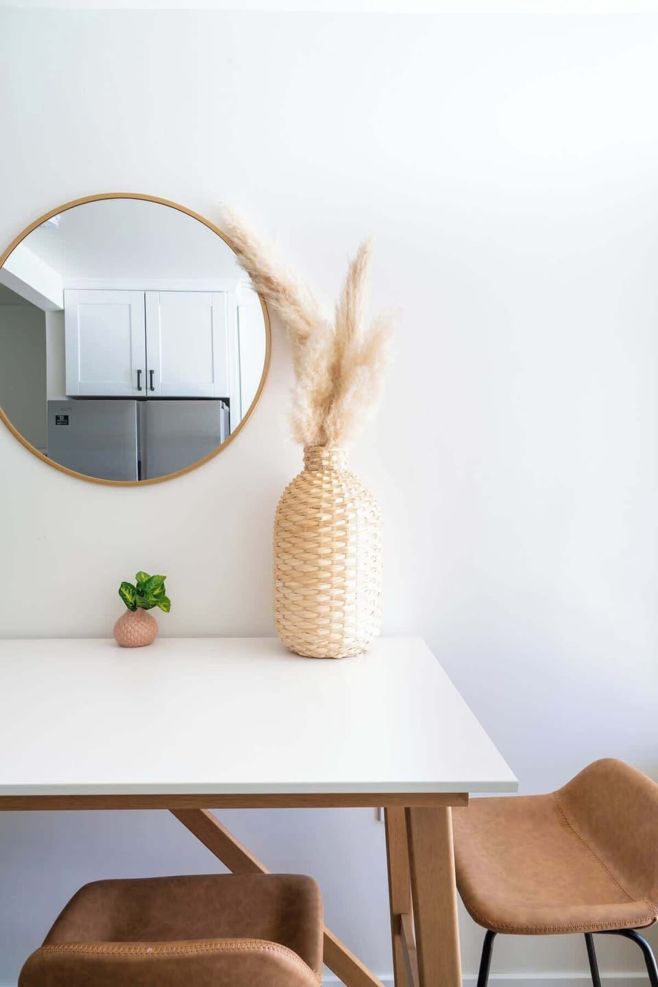 Eat together at the stylish dining table with seating for four