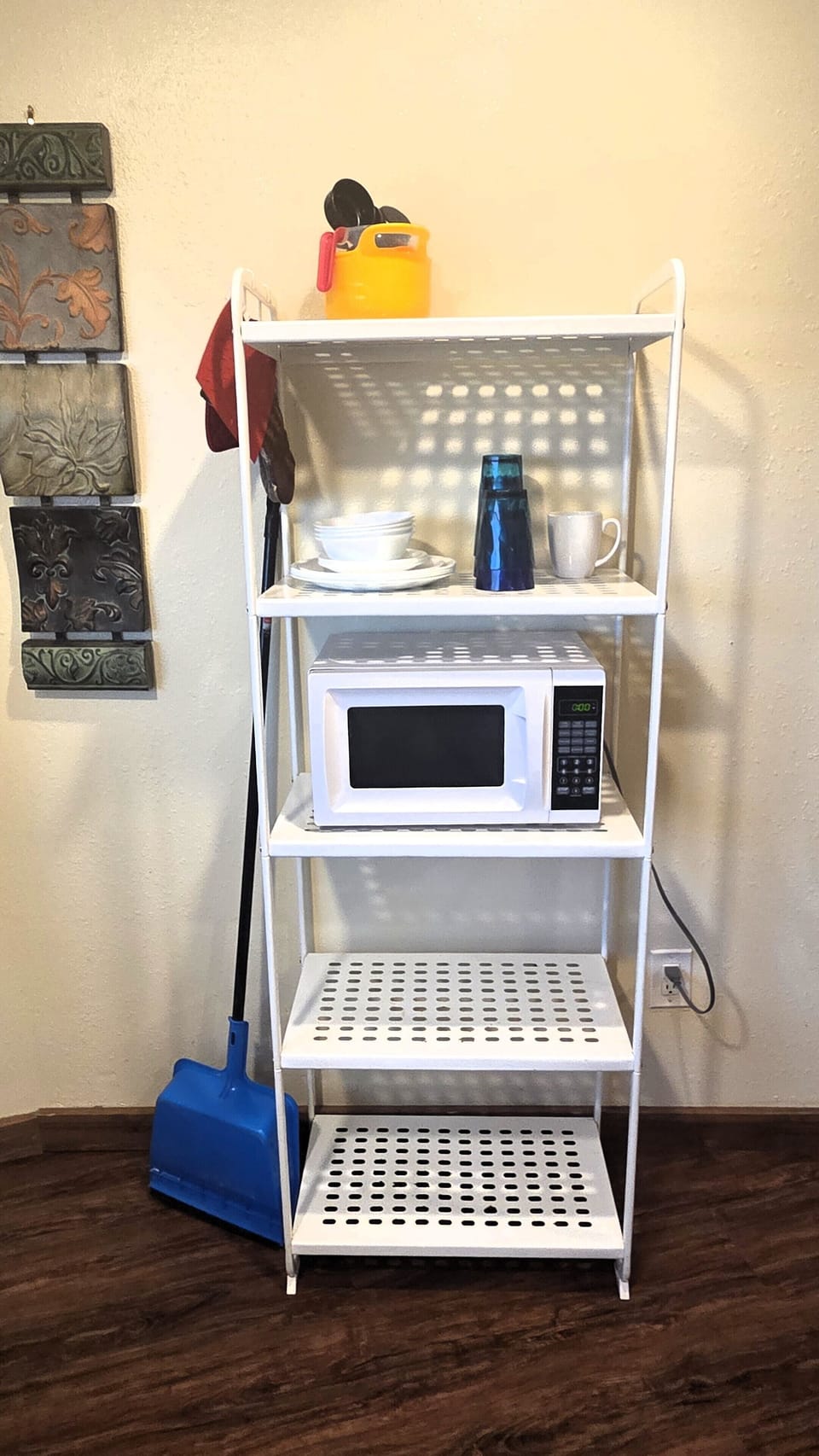 The baker's rack provides additional storage.