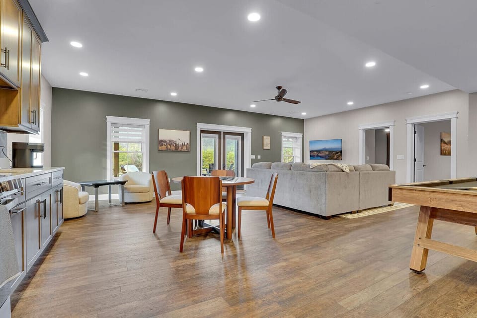 Downstairs/Basement: Extra Kitchen, Gaming Area with Pool Table, Electronic Games, and TV
