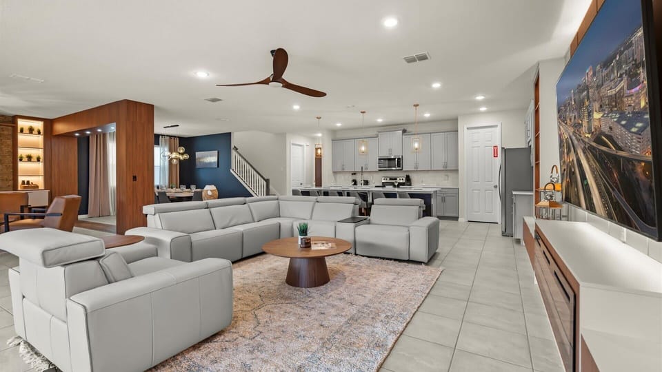 Spacious living area with dining and kitchen, perfect for families and large groups to relax together