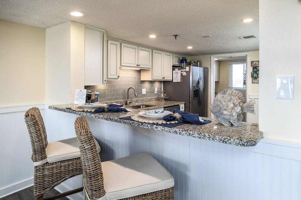 Condo (Surf Dweller 508 - Beachfront Boho) | Private kitchen | Cookware/dishes/utensils