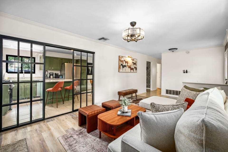 Enjoy the open flow between the living room and kitchen—cooking and conversation are always close by.