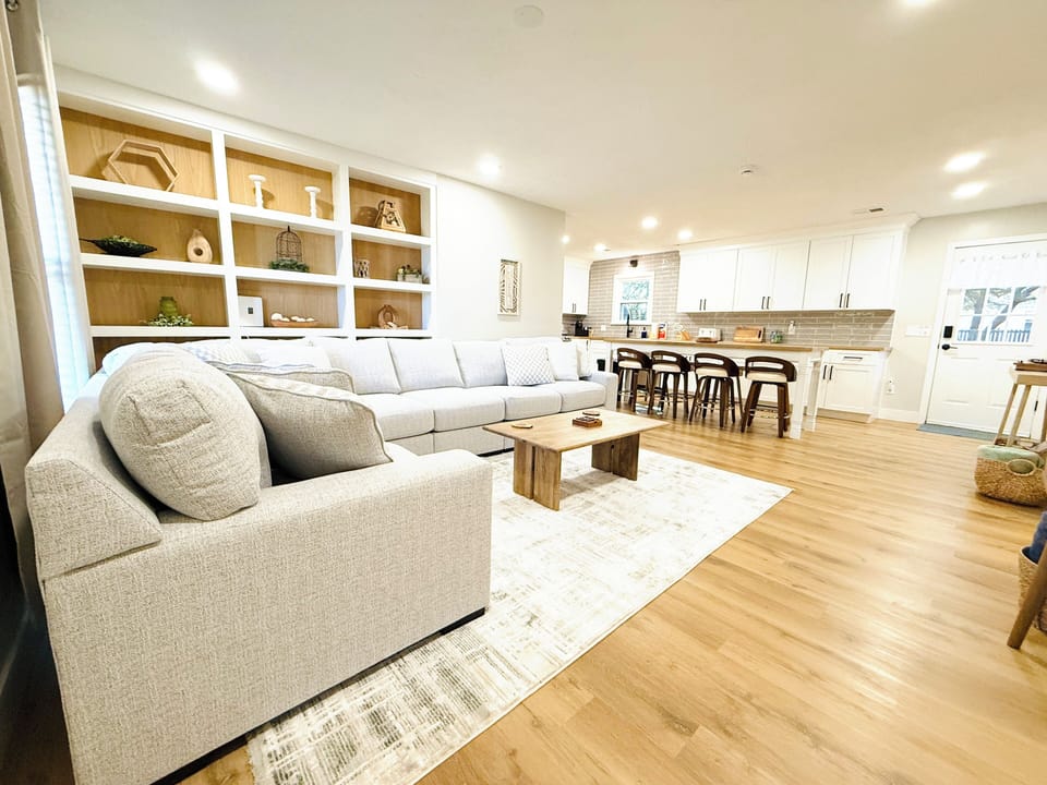 Open concept living room, kitchen and dining area