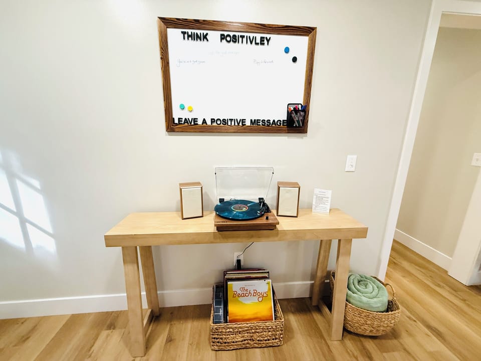 Play some tunes on the record player or through the Bluetooth speakers.