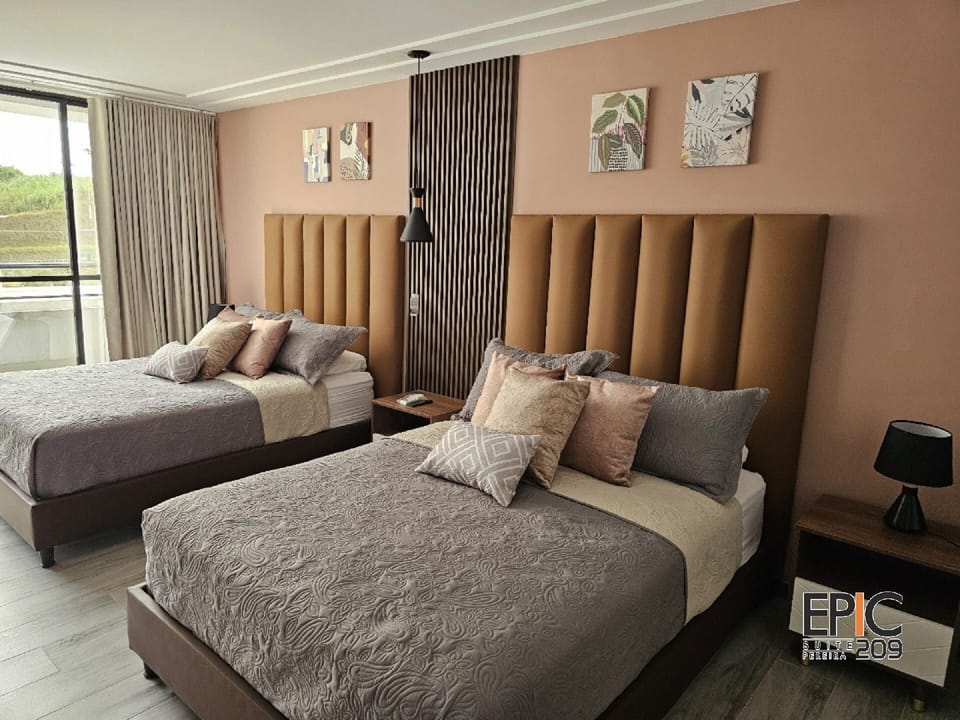 Suite | In-room safe, individually decorated, desk, laptop workspace