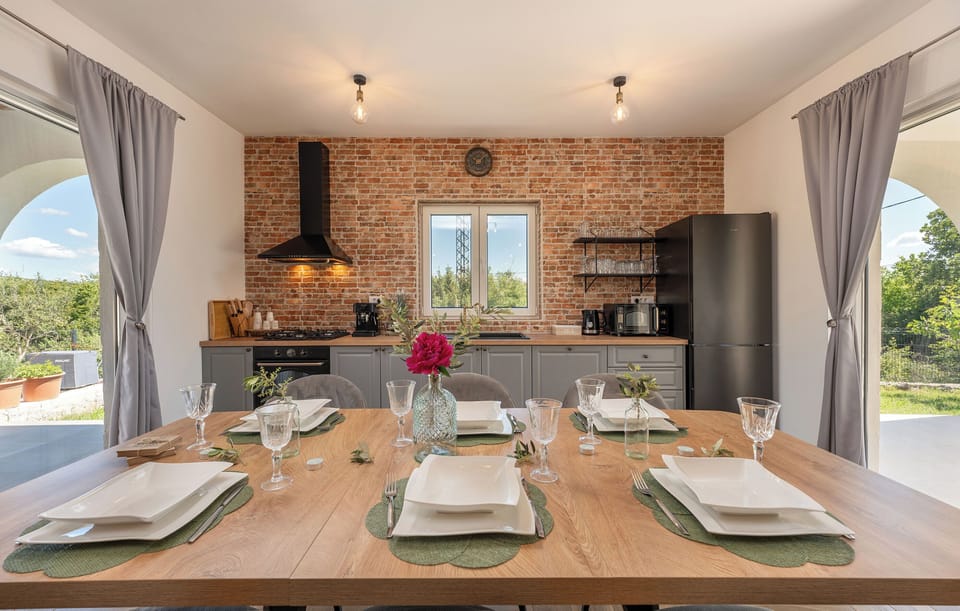 Villa | Private kitchen | Fridge, microwave, oven, stovetop