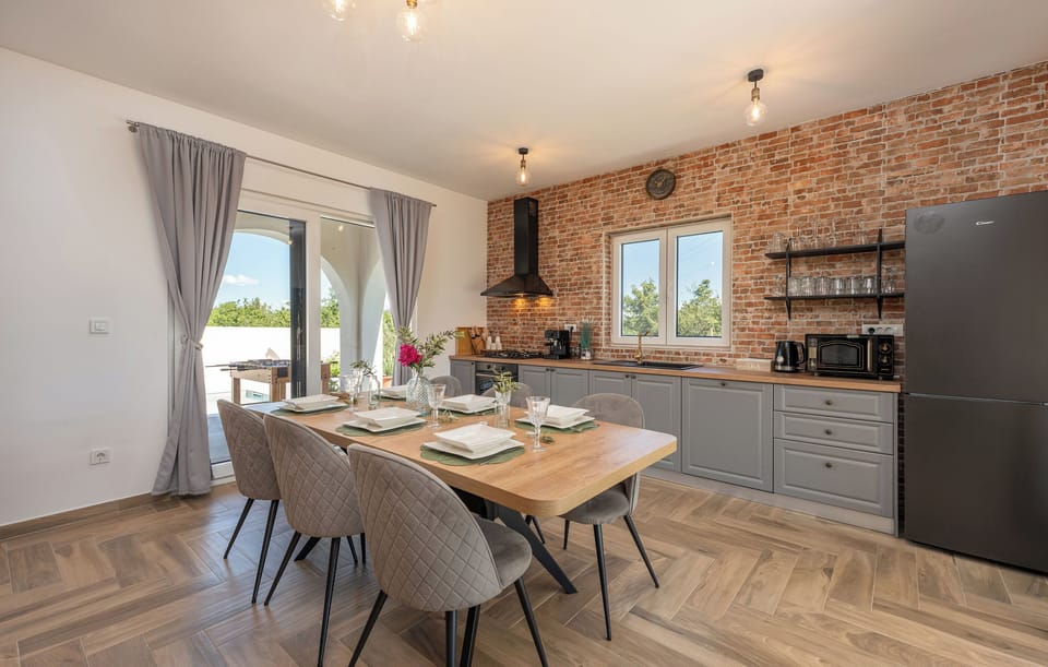 Villa | Private kitchen | Fridge, microwave, oven, stovetop