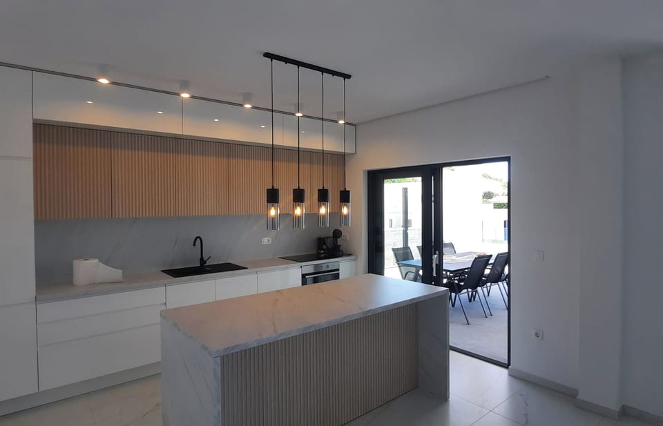 Villa | Private kitchen | Fridge, oven, stovetop, dishwasher