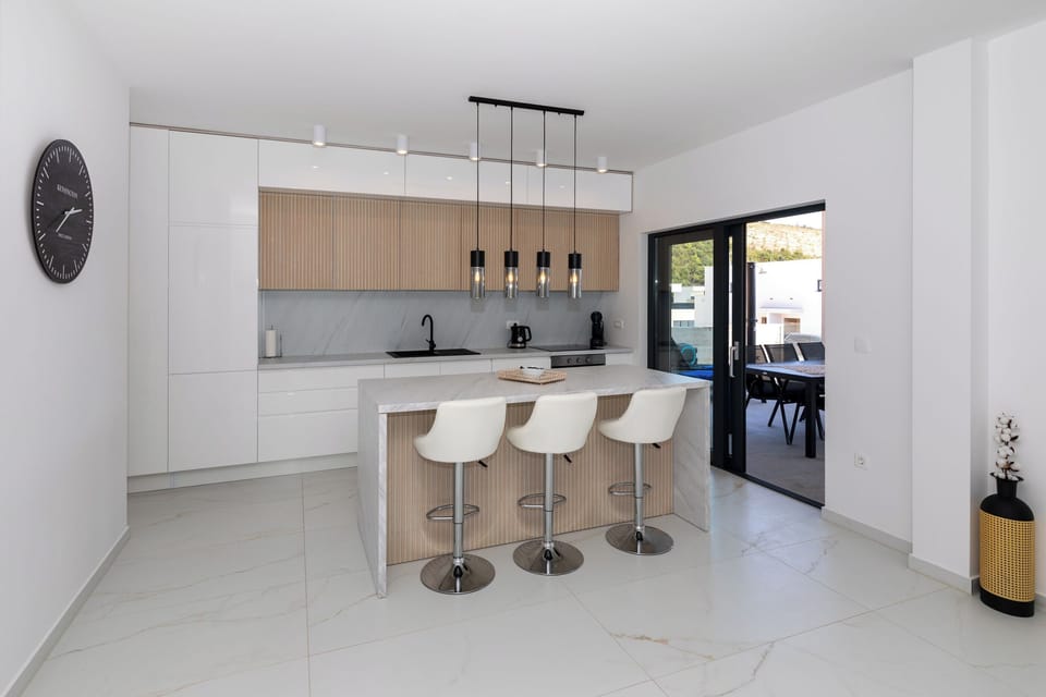 Villa | Private kitchen | Fridge, oven, stovetop, dishwasher