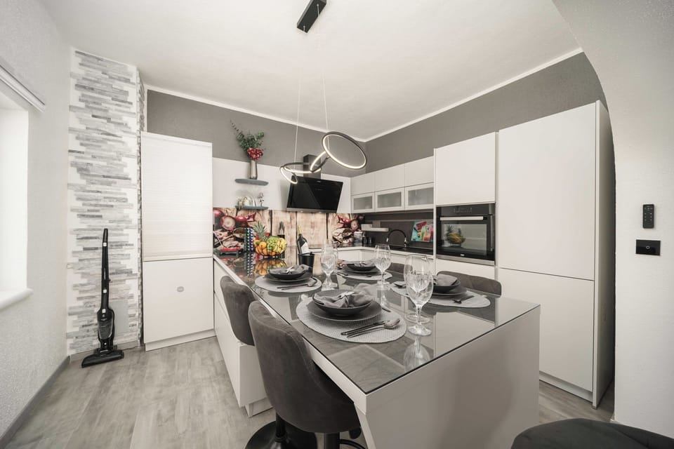 Villa | Private kitchen | Fridge, oven, stovetop, dishwasher